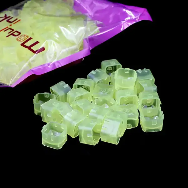 Пластиковые колпачки Modul Ink Cup под тату-краску прозрачные желтые – 100 штук купить недорого в Украине, фото 40027